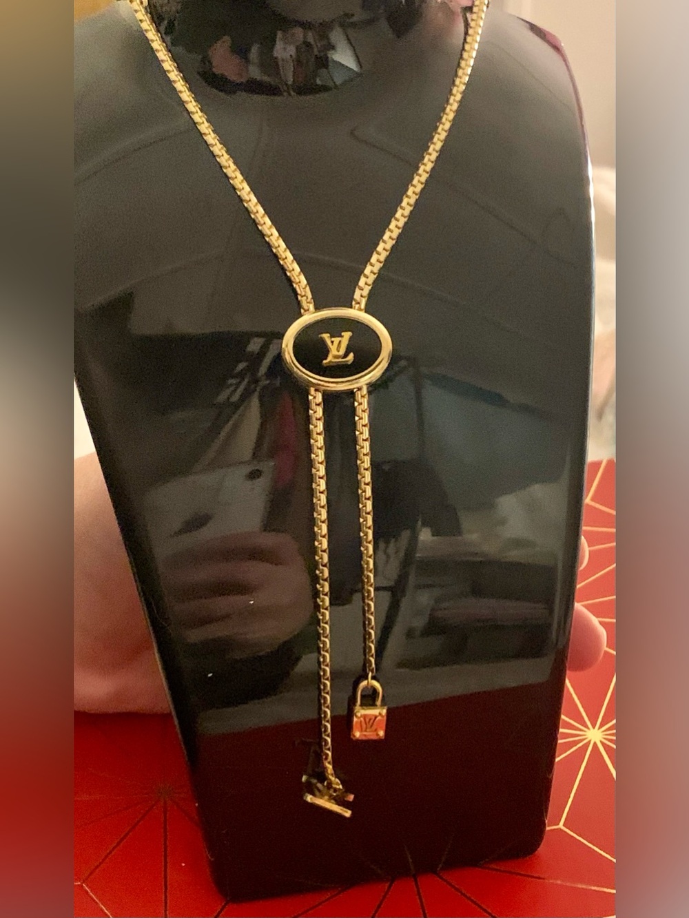 Brand new Gold and Black Lariat Necklace with Signature LV Medallion